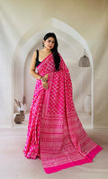 Pink saree with geometric motifs and traditional Bagru hand block print