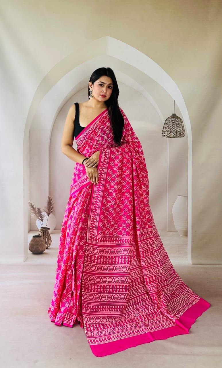 Pink saree with geometric motifs and traditional Bagru hand block print