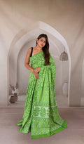 Green Bagru hand block print saree with floral motifs and bold border