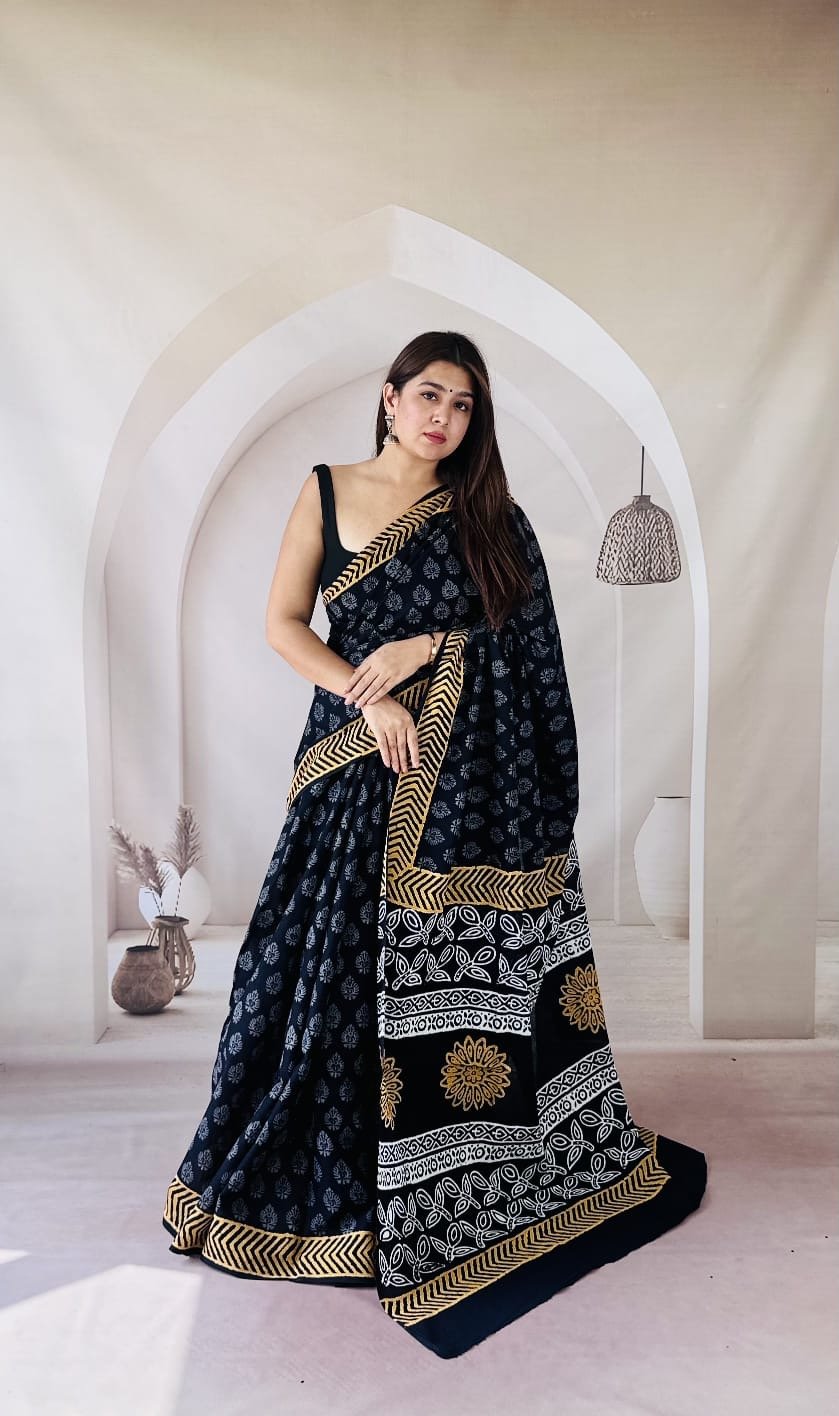 Navy blue saree with floral and geometric motifs in Bagru print