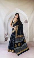 Black and gold saree with floral Bagru hand block print and intricate border design