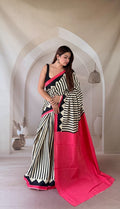 Black and cream striped saree with pink pallu and geometric motif