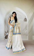 Saree with yellow and blue floral motifs on Mul Cotton fabric, blue border