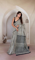 Black and white geometric pattern saree with intricate border details