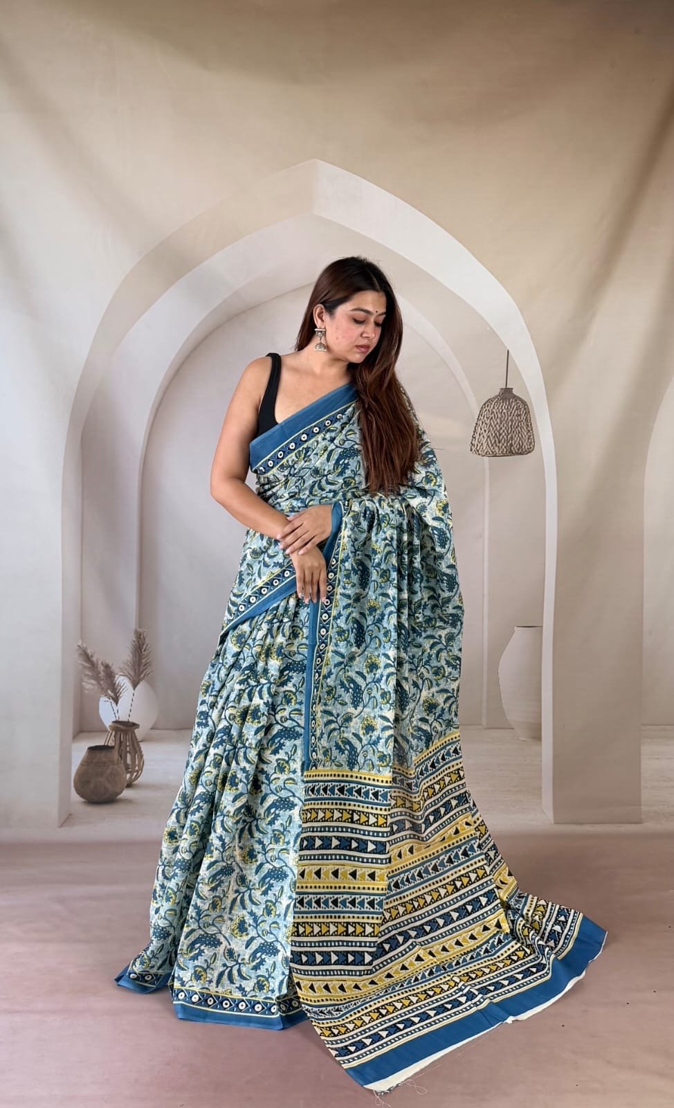 Blue saree with floral and geometric motifs in Bagru hand block print