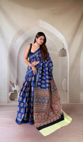 Blue saree with floral and geometric motifs in traditional Bagru hand block print