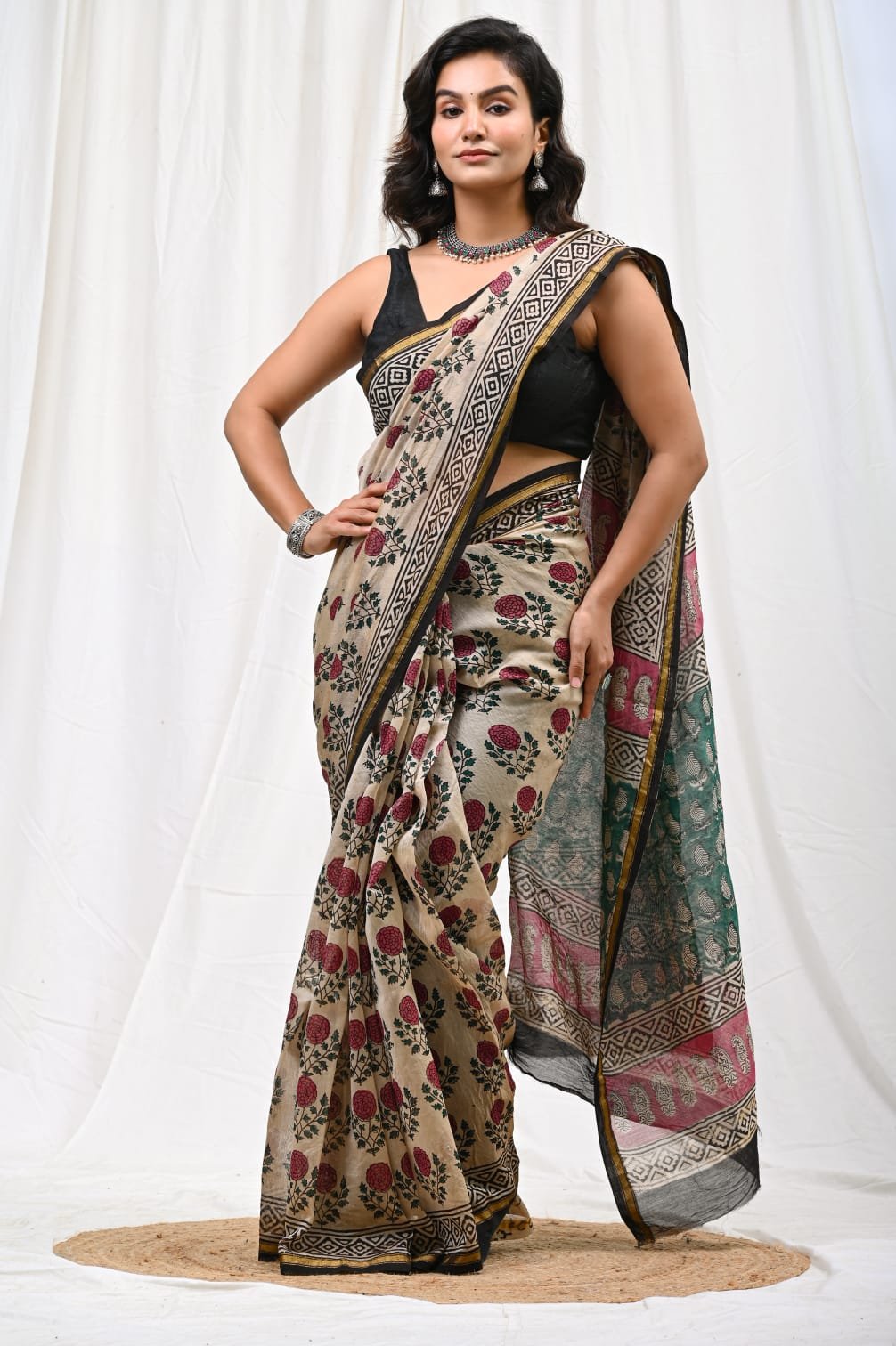 Beige Chanderi silk saree with maroon and green floral motifs
