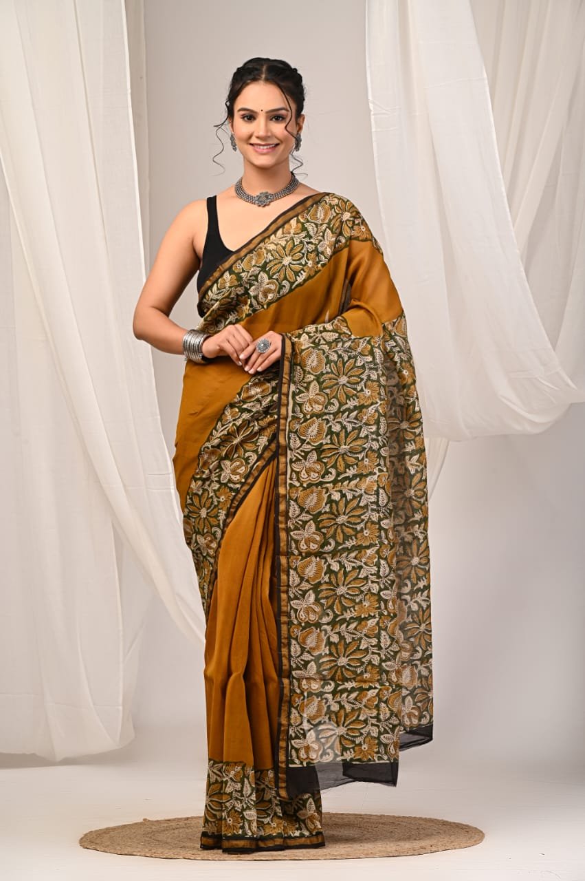 Mustard saree with green and ivory floral Bagru prints