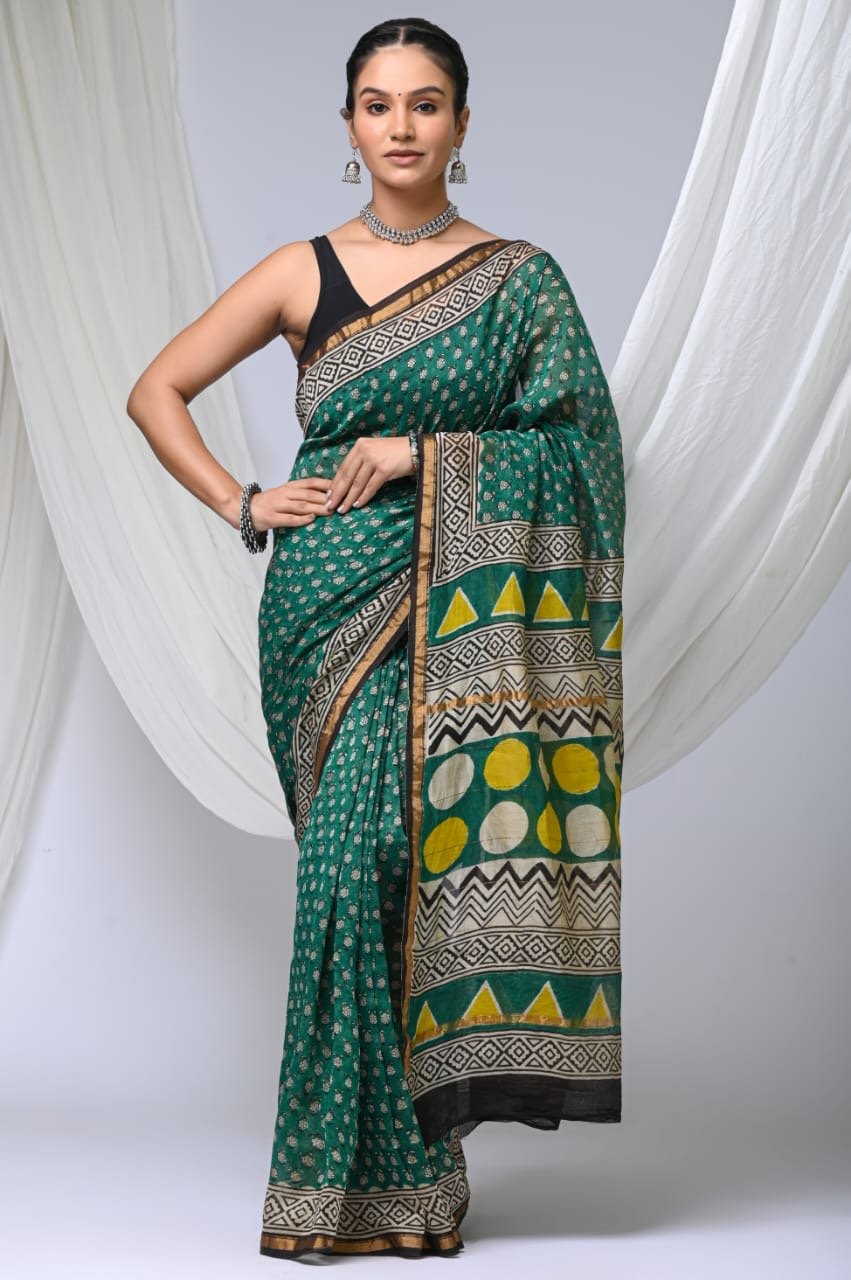 Green Chanderi silk saree with buti motifs and geometric borders