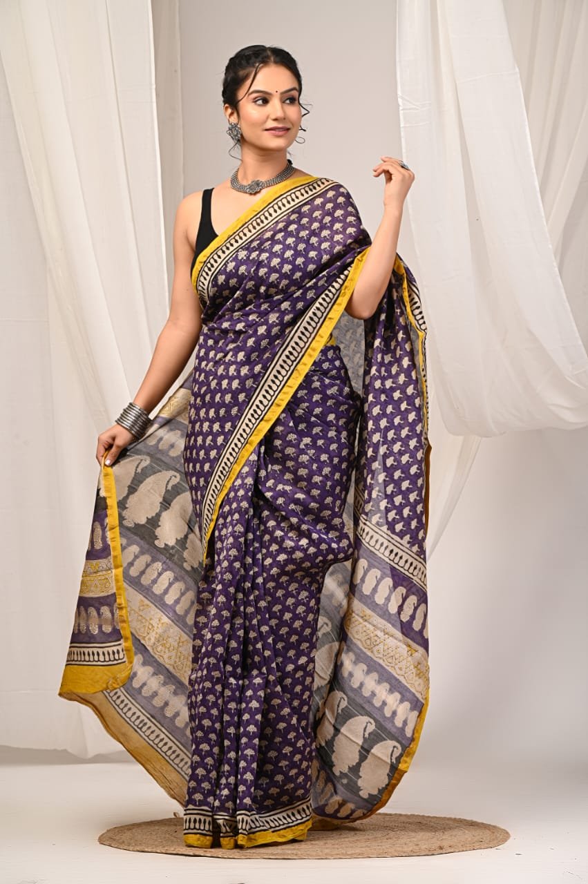 Purple saree with yellow border featuring buti motifs in Bagru hand block print