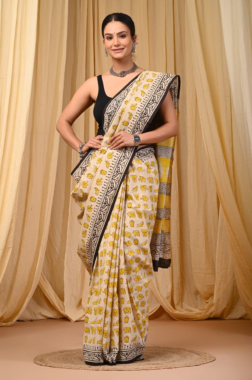 Saree with yellow elephant motifs and black geometric border on neutral fabric