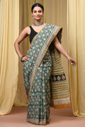 Green saree with floral motifs and striped pallu featuring Bagru hand block print