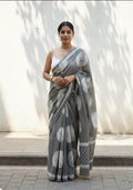 Grey saree with circular motifs and traditional Bagru print