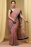 Red Mul Cotton saree with floral motifs and black border