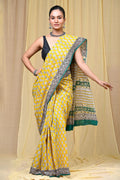 Yellow saree with floral motifs and geometric border design