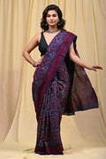 Navy blue saree with red floral motifs and traditional Bagru hand block print