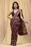 Brown saree with floral Bagru hand block print and intricate border