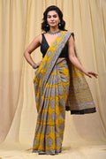 Yellow saree with mandala motifs and intricate border design