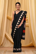 Black saree with geometric beige triangles and Bagru block print