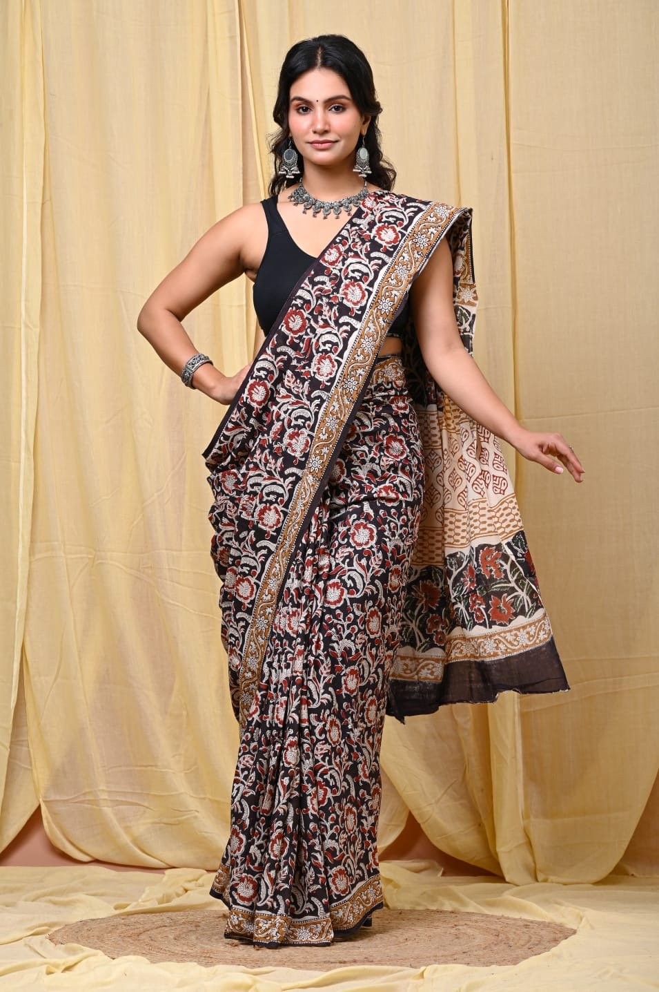 Black and red floral Bagru hand block print saree with intricate border
