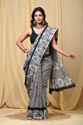 Black and white saree with elephant motifs and geometric patterns in Bagru print