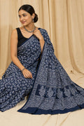 Navy blue saree with white floral motifs in Bagru hand block design