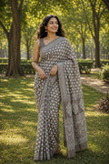 Grey and white floral Bagru hand block printed saree with a detailed border