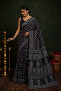 Black saree with red and white floral motifs, traditional Bagru hand block print