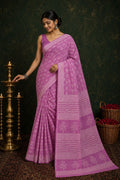 Pink saree with floral block print design showcasing traditional Bagru craft